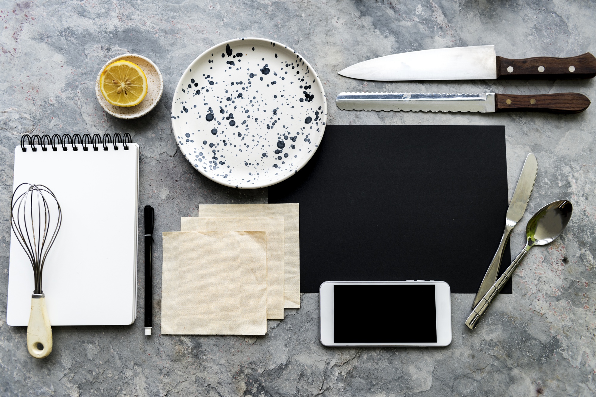 Flat lay of course materials and utensils